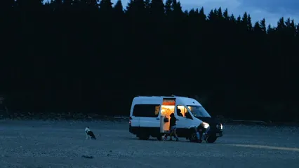 Horizontal video: Couple with their dog camping in a campervan in a beach 9354178. Duration: 13 seconds. Resolution: 1920x1080