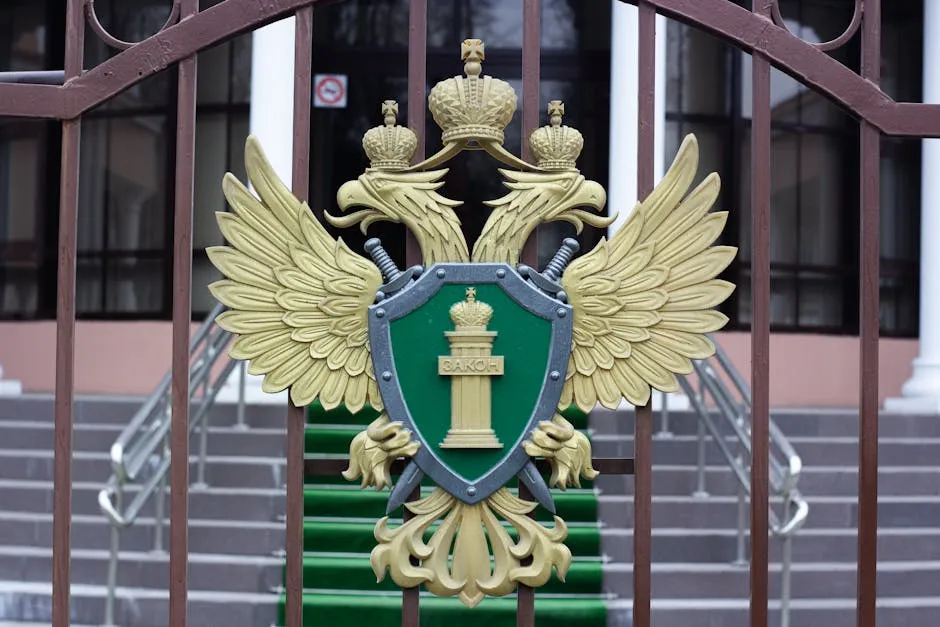 Golden Emblem on Building Fence