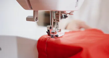 Horizontal video: An atelier sewing a cloth 9850291. Duration: 23 seconds. Resolution: 4096x2160