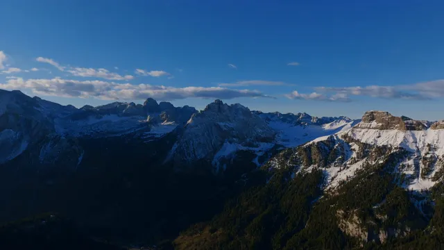 Horizontal video: Stunning aerial view of snow capped mountains 28891500. Duration: 11 seconds. Resolution: 3840x2160