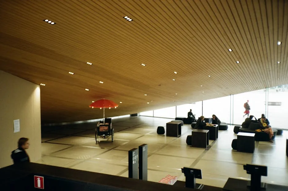 People Sitting on Chairs Inside the Building