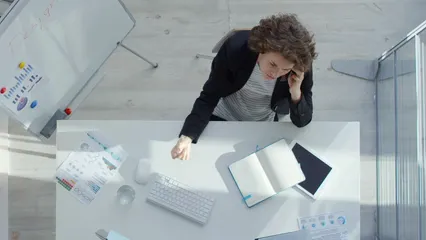 Horizontal video: Woman taking notes while talking to someone over the phone 3115209. Duration: 23 seconds. Resolution: 3840x2160