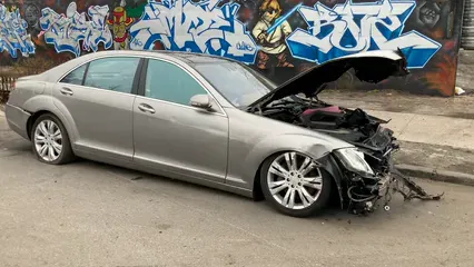 Horizontal video: A wrecked car on the street 3974558. Duration: 21 seconds. Resolution: 1920x1080