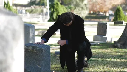 Horizontal video: Man mourning the dead 6840727. Duration: 19 seconds. Resolution: 1920x1080