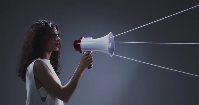 Horizontal video: Woman using a megaphone 7859986. Duration: 24 seconds. Resolution: 4096x2160