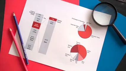 Horizontal video: A magnifying glass and a sales report 7947434. Duration: 7 seconds. Resolution: 1920x1080