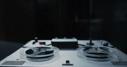 Horizontal video: A vintage reel tape recorder spinning 8382683. Duration: 28 seconds. Resolution: 4096x2160