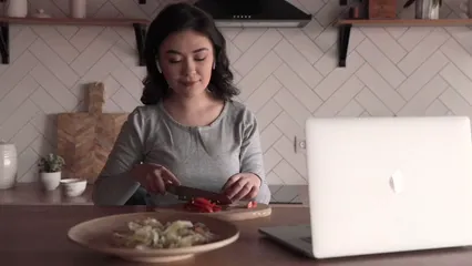 Horizontal video: A woman doing cooking lesson online 4052980. Duration: 23 seconds. Resolution: 3840x2160