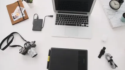 Horizontal video: High angle shot of a graphics tablet and a laptop 4464844. Duration: 13 seconds. Resolution: 3840x2160