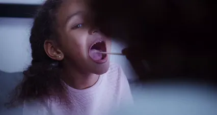 Horizontal video: A person checking the throat of the girl 5867893. Duration: 19 seconds. Resolution: 4096x2160