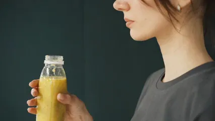 Horizontal video: A woman drinking a healthy drink 6740769. Duration: 17 seconds. Resolution: 1920x1080