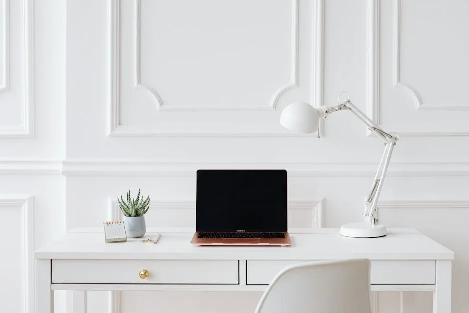 Laptop on White Wooden Desk