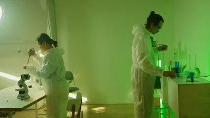 Horizontal video: Chemists doing an experiment in a laboratory 8534098. Duration: 10 seconds. Resolution: 3840x2160