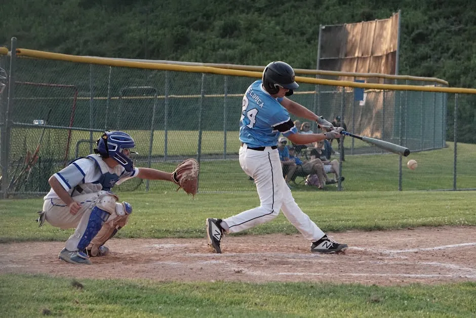 Man Hitting a Baseball