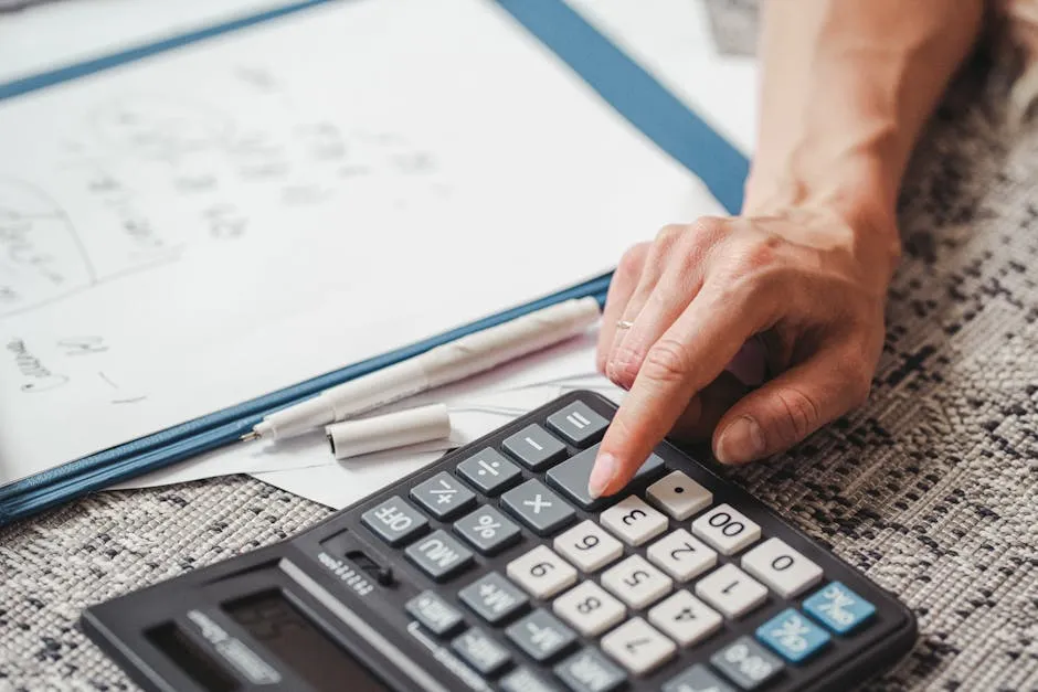 A Person using a Calculator