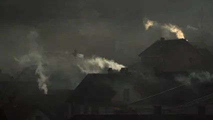 Horizontal video: House roofs with smoking chimneys 10799308. Duration: 11 seconds. Resolution: 3840x2160