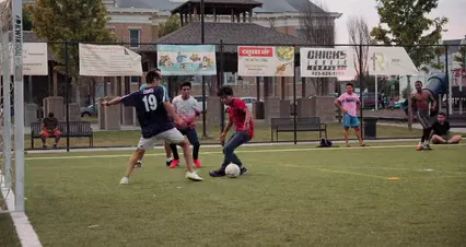 Horizontal video: Group of boys plays soccer in a soccer field 2932301. Duration: 15 seconds. Resolution: 4096x2160