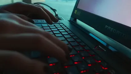 Horizontal video: A person typing on a laptop keyboard 4496268. Duration: 18 seconds. Resolution: 1920x1080