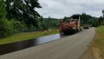 Horizontal video: A truck paving a road 6077445. Duration: 25 seconds. Resolution: 1920x1080