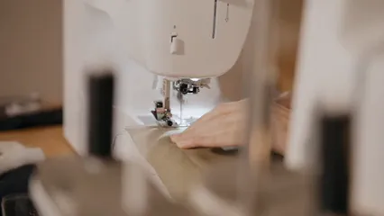 Horizontal video: Woman sewing cloth with machine 6460113. Duration: 11 seconds. Resolution: 1920x1080