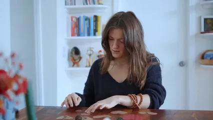 Horizontal video: A woman putting together heart shaped puzzle pieces 6670496. Duration: 15 seconds. Resolution: 1920x1080