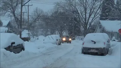 Horizontal video: Driving in the street covered in heavy snow fall 3777659. Duration: 15 seconds. Resolution: 1920x1080