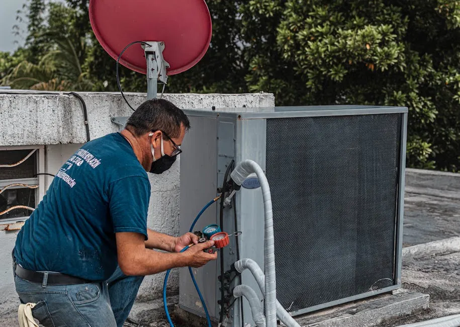 Man Checking an Air Conditioner