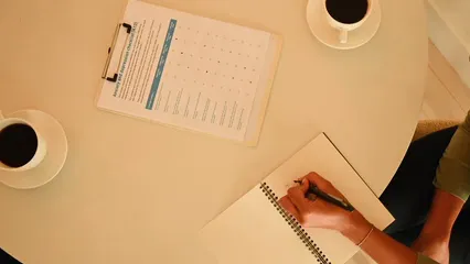 Horizontal video: Woman psychologist taking notes from client s form 5697341. Duration: 15 seconds. Resolution: 3840x2160
