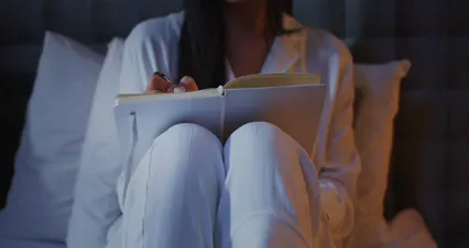 Horizontal video: Woman writting in a diary 6940836. Duration: 46 seconds. Resolution: 4096x2160