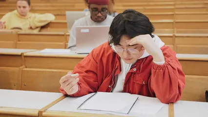 Horizontal video: A student taking a written exam 8196796. Duration: 10 seconds. Resolution: 1920x1080