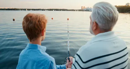 Horizontal video: Man and boy holding a fishing rod 8918146. Duration: 19 seconds. Resolution: 4096x2160