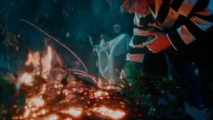 Horizontal video: A man and a woman sitting by a bonfire 8976318. Duration: 20 seconds. Resolution: 3840x2160