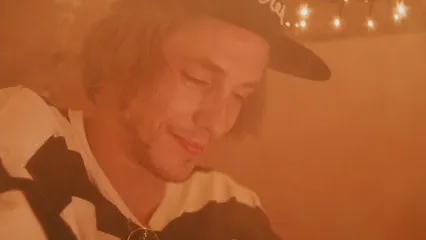 Horizontal video: A man putting a cannabis on a book 8976556. Duration: 29 seconds. Resolution: 3840x2160