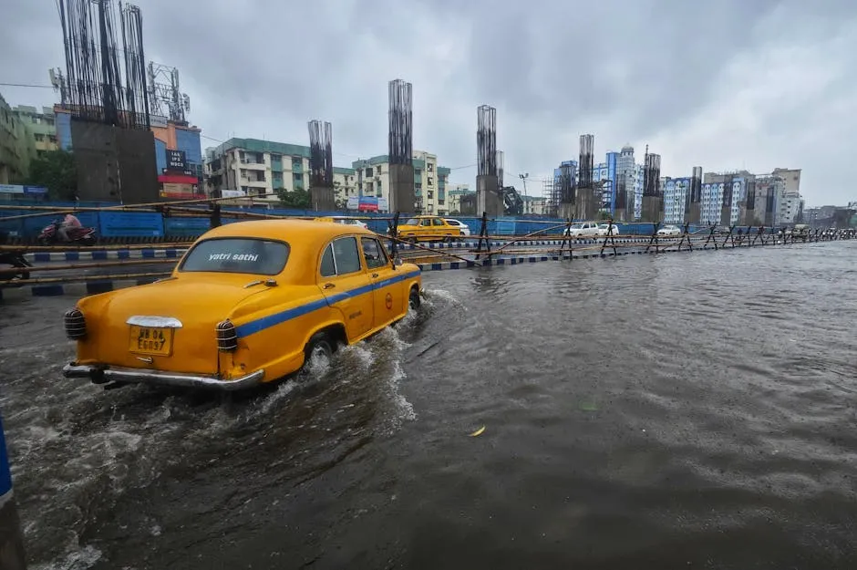 Cars Driving through a Flooded Street