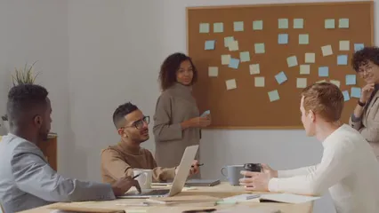 Horizontal video: A group of people brainstorming in a meeting room and happily agreeing with a handshake on a plan 3253079. Duration: 16 seconds. Resolution: 3840x2160