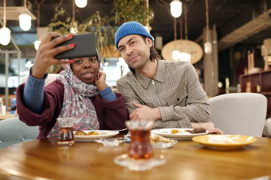 Couple Taking Selfie in Restaurant