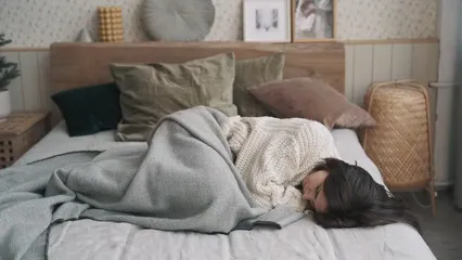 Horizontal video: Emotional woman lying on bed 6689162. Duration: 11 seconds. Resolution: 1920x1080