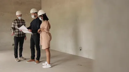 Horizontal video: Man explaining the floor plan to the clients 8482292. Duration: 30 seconds. Resolution: 1920x1080