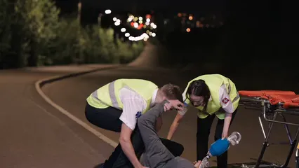 Horizontal video: Paramedics assisting a patient 8944323. Duration: 17 seconds. Resolution: 1920x1080