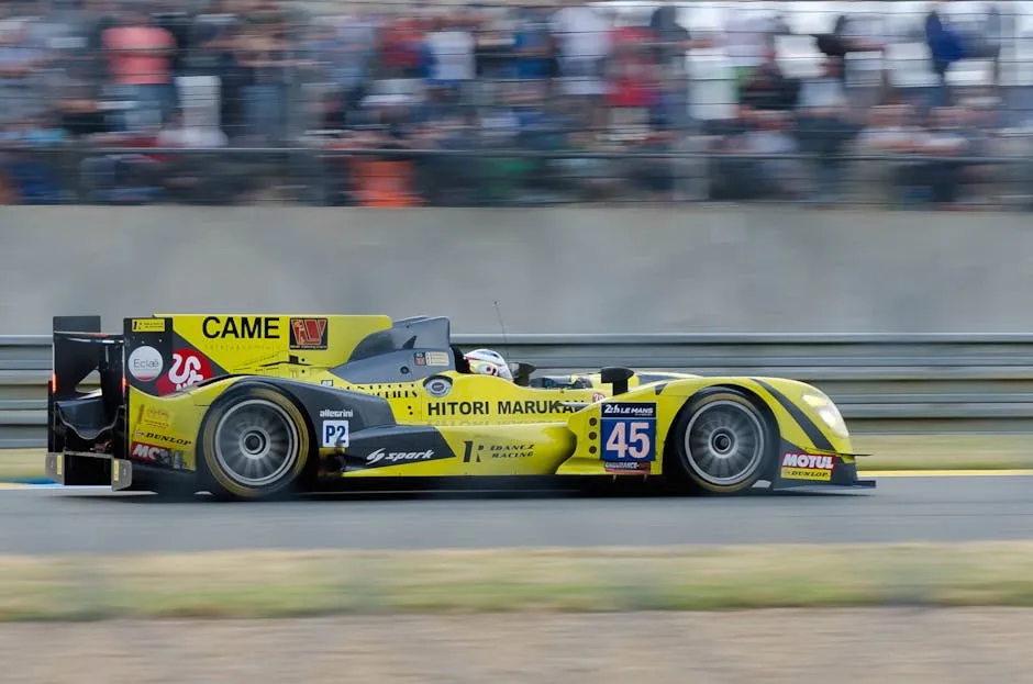 Yellow Race Car on Track