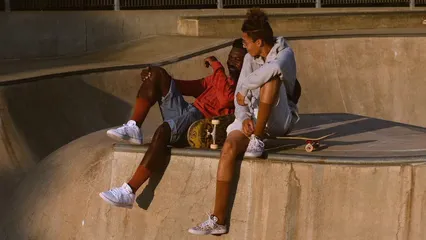 Horizontal video: Two young men hanging out in a skate park ramp 5155845. Duration: 11 seconds. Resolution: 3840x2160