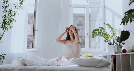 Horizontal video: A young beautiful pregnant woman relaxing on bed 5852482. Duration: 42 seconds. Resolution: 4096x2160
