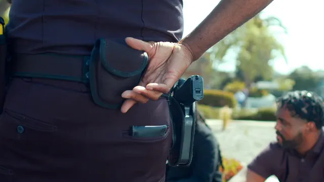 Horizontal video: Community police men with firearms 7714043. Duration: 10 seconds. Resolution: 3840x2160
