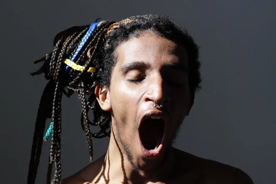 Close Up Photo of a Man Yawning
