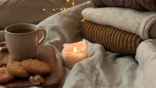 Horizontal video: Close up of a candle and a cup of tea 9968977. Duration: 8 seconds. Resolution: 3840x2160
