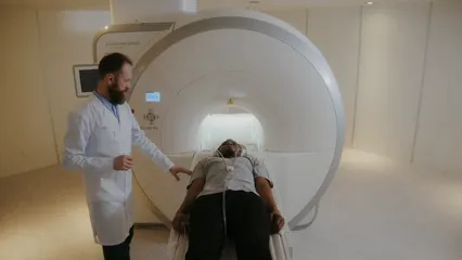 Horizontal video: A doctor preparing a patient for a mri test 7088467. Duration: 40 seconds. Resolution: 3840x2160