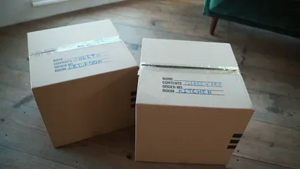 Horizontal video: Labeled boxes of belongings 7463988. Duration: 9 seconds. Resolution: 1920x1080