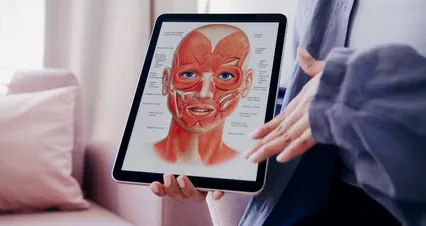 Horizontal video: Tablet displaying face anatomy 8075403. Duration: 31 seconds. Resolution: 4096x2160