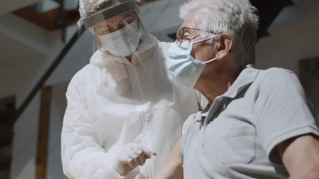 Horizontal video: Elderly man having his vaccine 8945485. Duration: 19 seconds. Resolution: 3840x2160