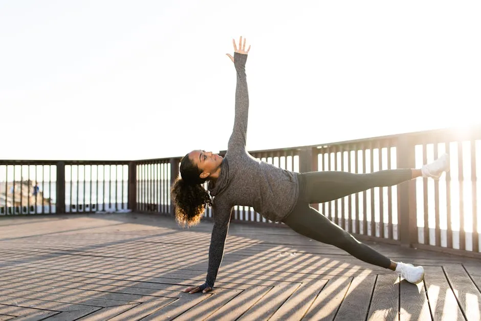 A Woman Doing a Side Plank With One Leg Lifted